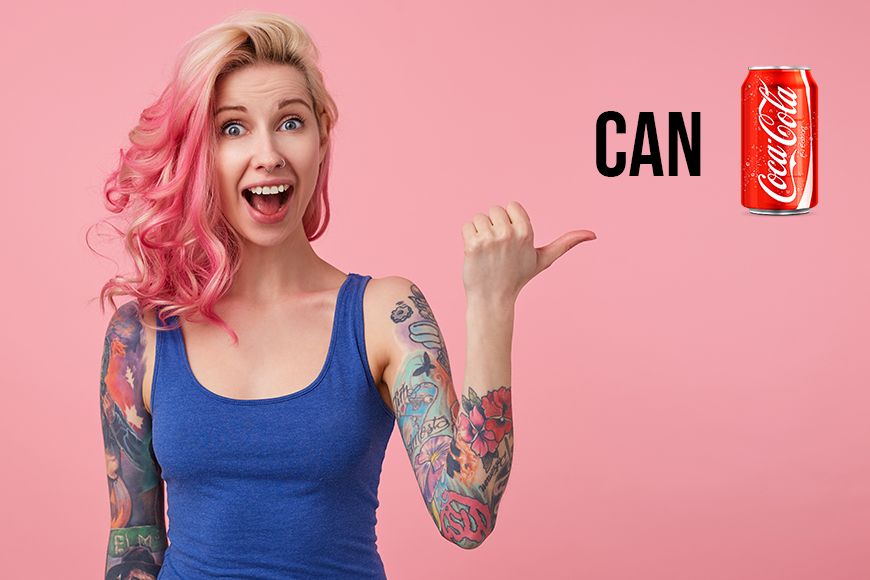 Young happy amazed nice pink haired lady in blue t-shirt, hears