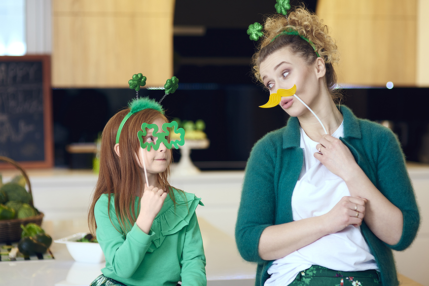 Cheerful mother and daughter enjoying together